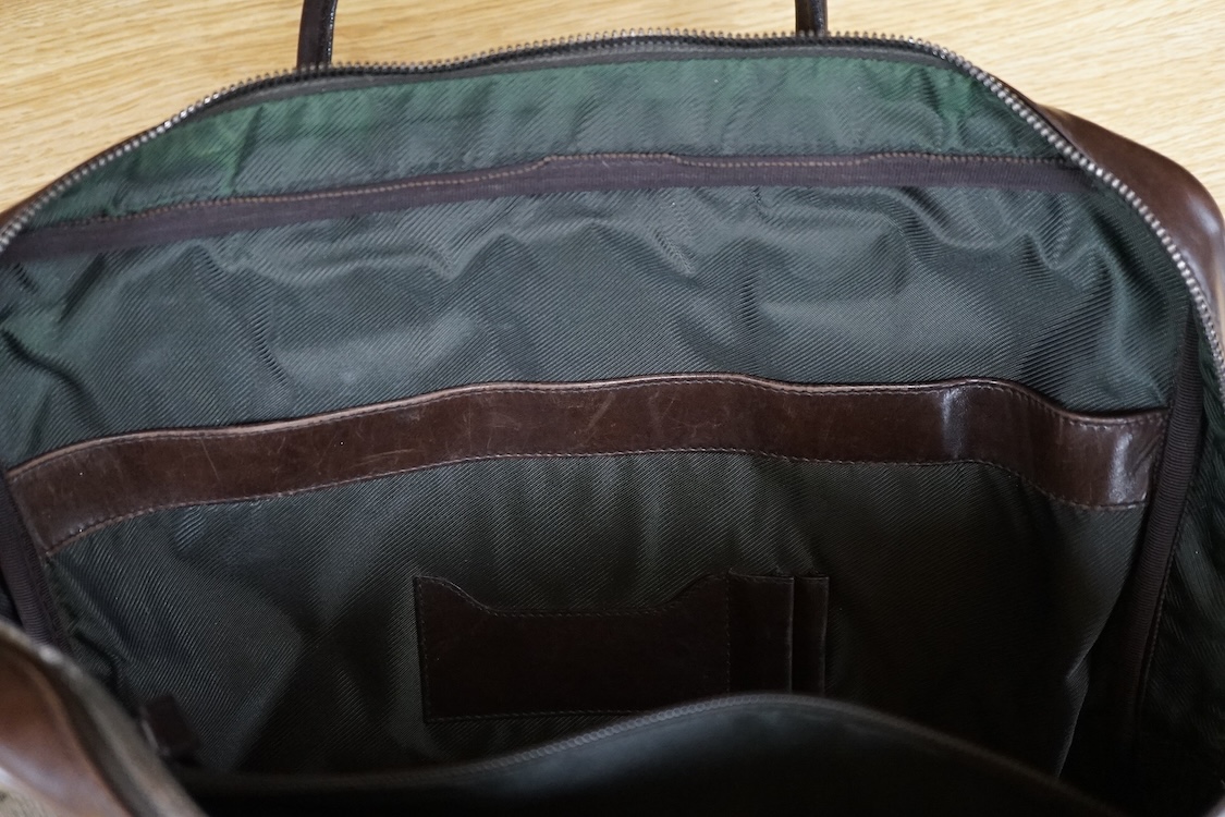 A Gucci supreme monogram travel case, 40cm wide